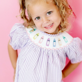 Poppy Kids Co Purple Crayon Girls Bubble Smocked Romper